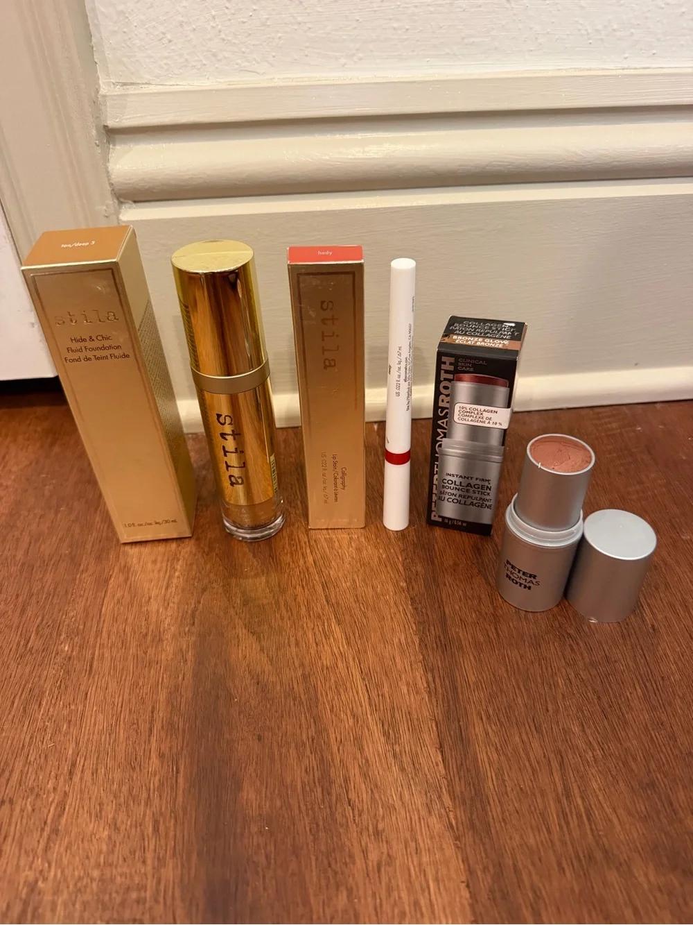 Stila Hide & Chic Foundation, lippy, and Peter Thomas Roth
